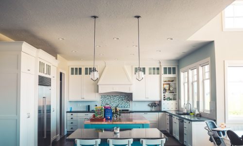 Kitchen with blue painted cabinets.