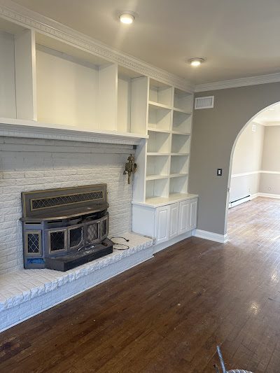 After fireplace and bookshelves interior painting in Manalapan, NJ. Preview Image 1