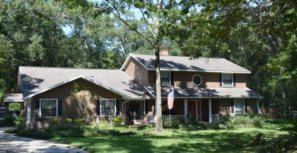 Light Brown Residential Painting With White Trim ...
