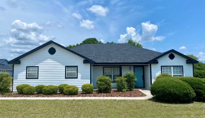 White Home Blue Front Door Painting