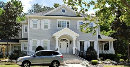 Light Gray Traditional-Style Home Exterior With White Trim ...