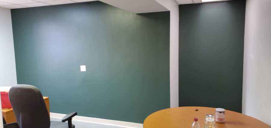 green accent wall in office space Preview Image 1