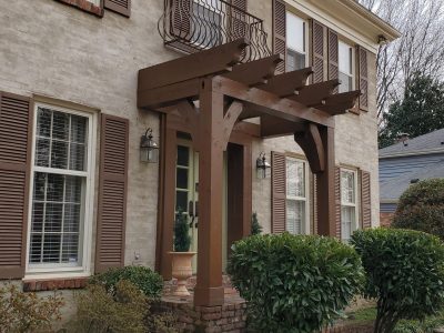 The porch had a pergola design.