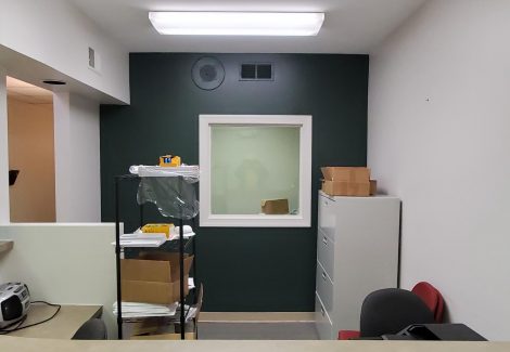 green accent wall in office space