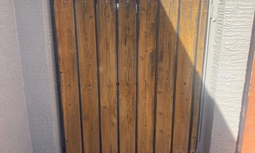 Faded and weathered gate