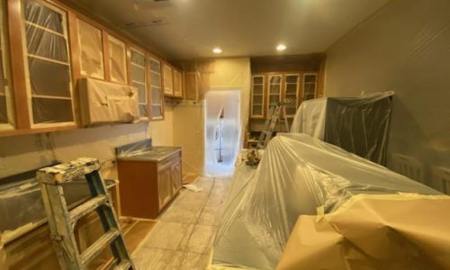 The kitchen is ready to be sprayed white