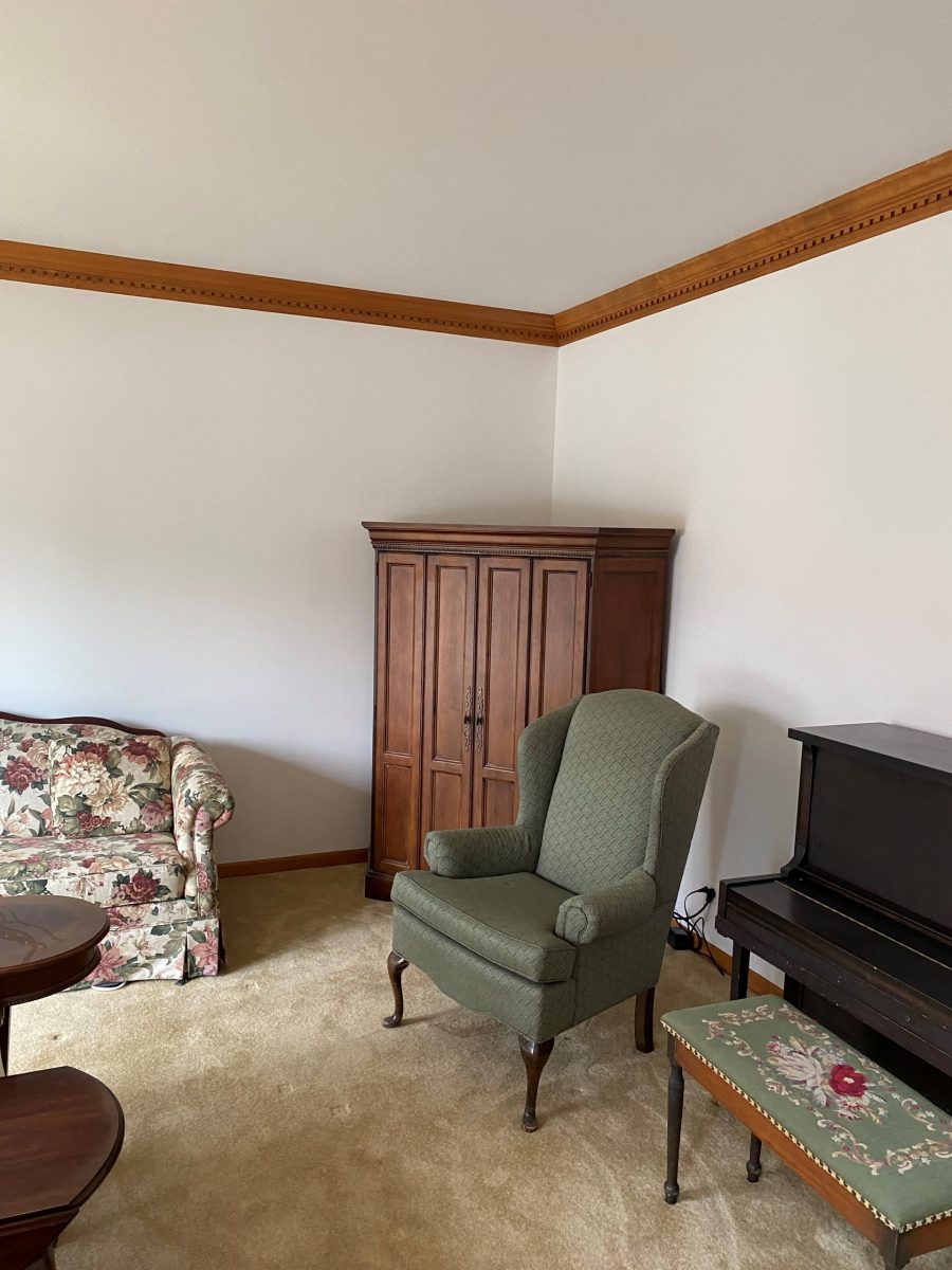 corner of a room with a cabinet Preview Image 3