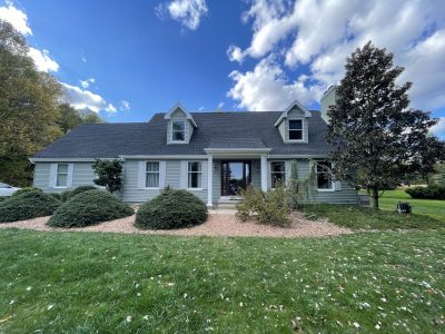 a blue-gray exterior house painting project in new jersey