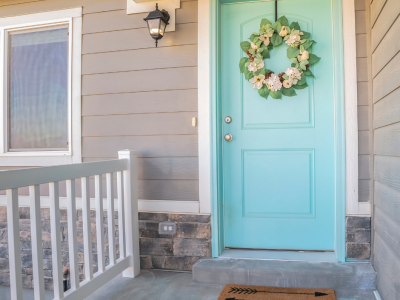 Tan Siding Blue Door