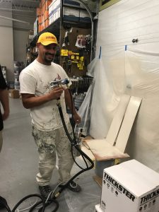 James Jefferson using Graco HVLP Sprayer to paint kitchen cabinets