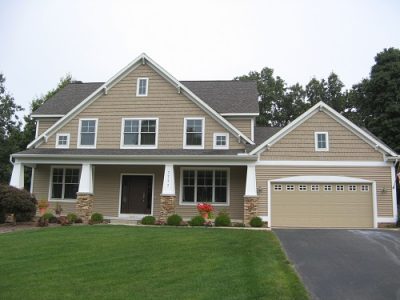Exterior painting by CertaPro house painters in Cascade, MI
