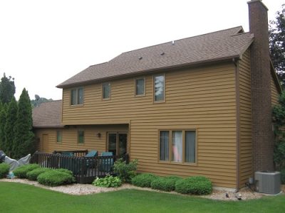 Exterior house painting by CertaPro painters in Cascade, MI
