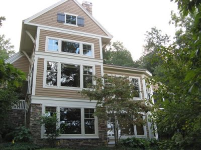 Exterior painting by CertaPro house painters in Ada, MI