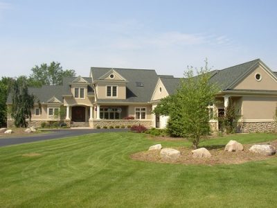 Exterior house painting by CertaPro painters in Cascade, MI