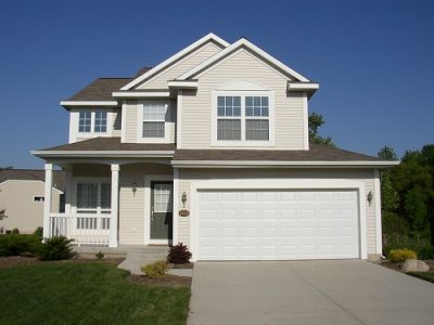 Exterior painting by CertaPro house painters in Grand Rapids, MI