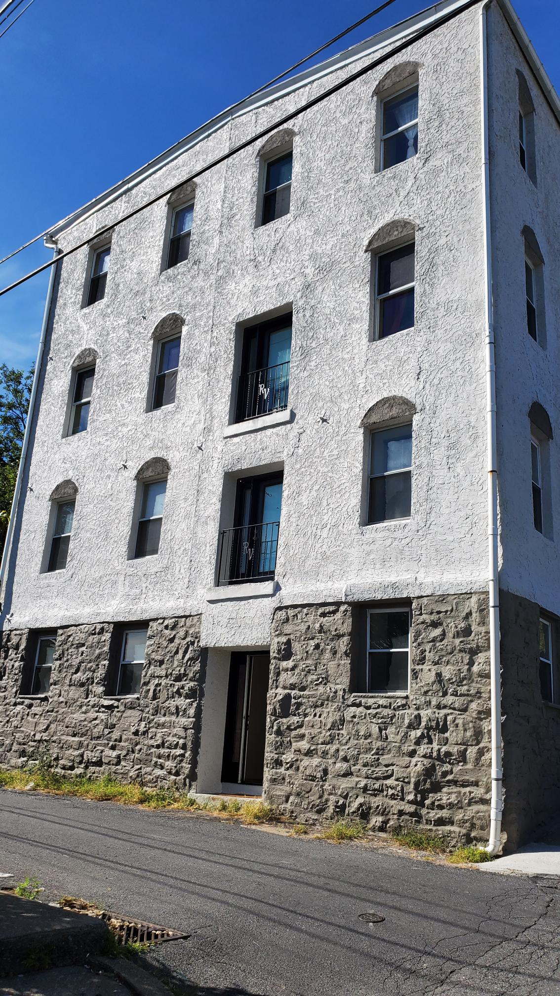 Side of River Rock Management after completed commercial exterior painting project by CertaPro Painters of the Greater Lehigh Valley