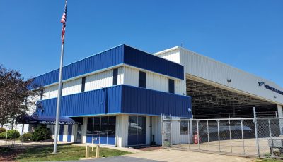 Commercial Exterior Painting Project in progress at New World Aviation in Allentown, PA - CertaPro Painters of the Greater Lehigh Valley