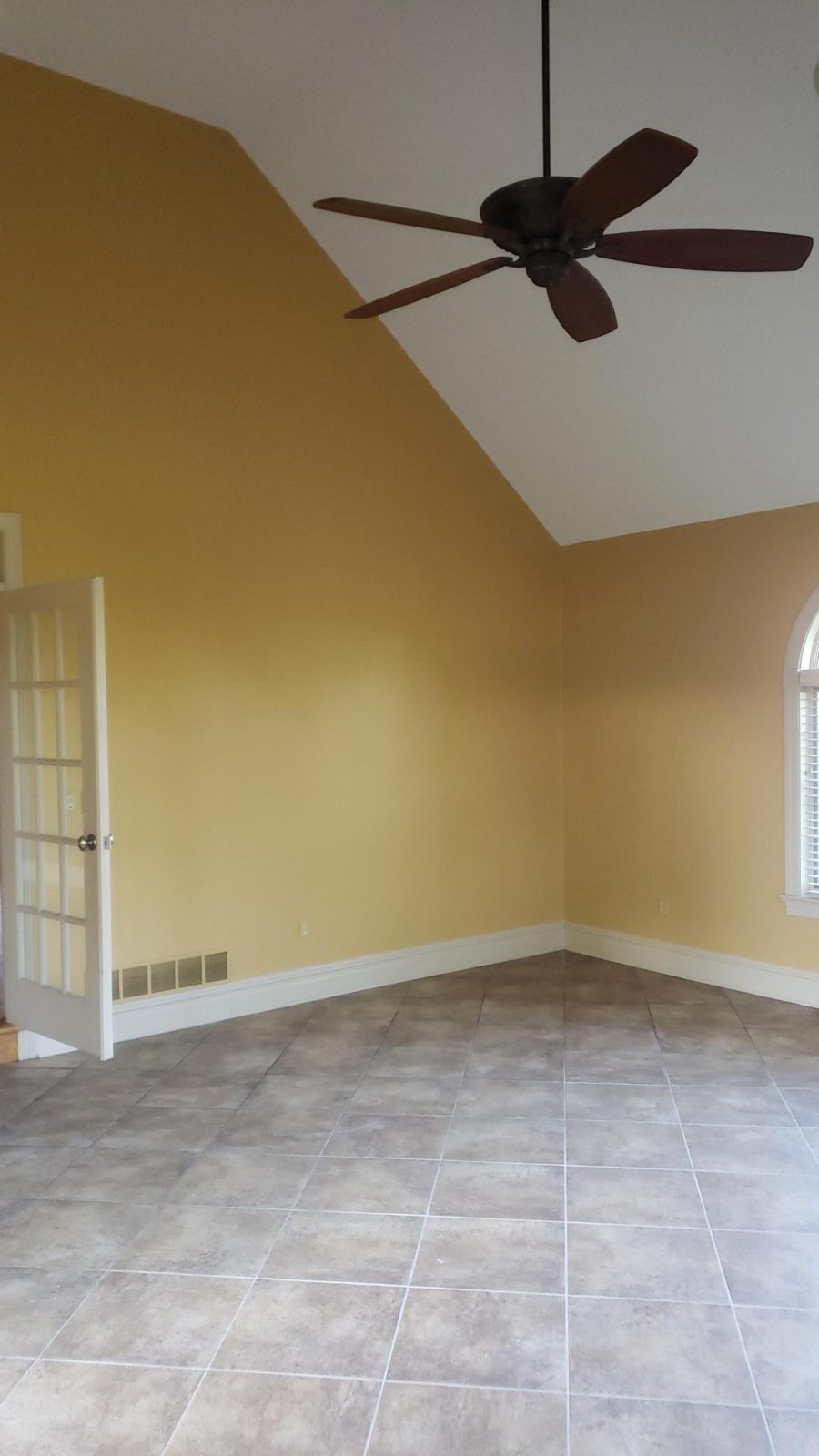 Beige Walls and White Door in Easton, PA, after completed residential interior painting project by CertaPro Painters of the Greater Lehigh Valley