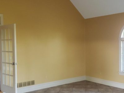 Beige Walls and White Door in Easton, PA, after completed residential interior painting project by CertaPro Painters of the Greater Lehigh Valley
