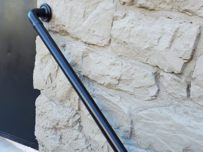 Stair Railing after completed commercial exterior painting project for River Rock Management by CertaPro Painters of the Greater Lehigh Valley