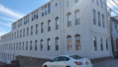 Corner Angle of Completed commercial exterior painting project at River Rock Management by CertaPro Painters of the Greater Lehigh Valley