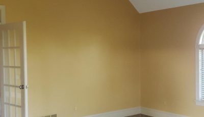 Beige Walls and White Door in Easton, PA, after completed residential interior painting project by CertaPro Painters of the Greater Lehigh Valley