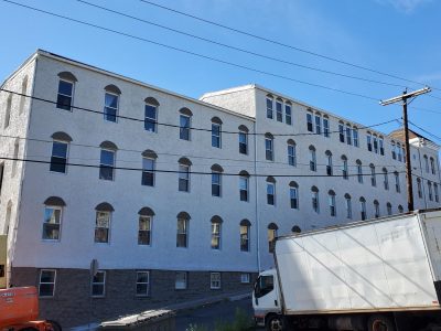 Front Angle of River Rock Management after completed commercial exterior painting project by CertaPro Painters of the Greater Lehigh Valley - Angle 2