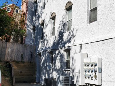 Side Angle of River Rock Management after completed commercial exterior painting project by CertaPro Painters of the Greater Lehigh Valley - Angle 2