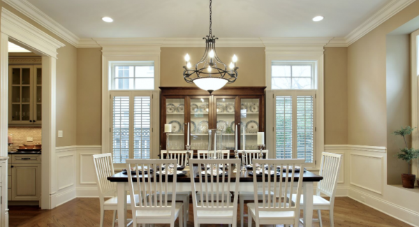 Dining room with large table and chandelier