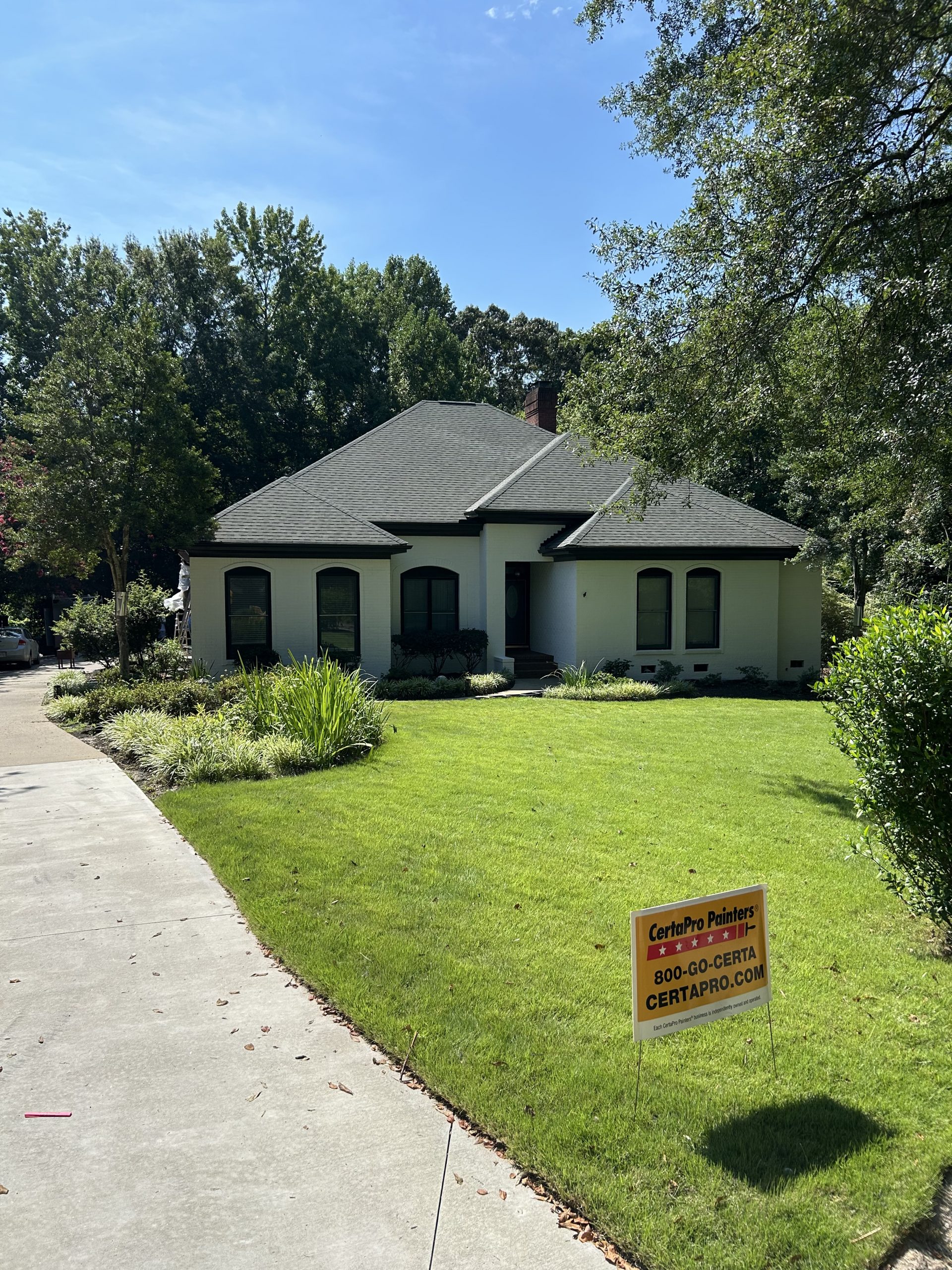 White brick house after painting project