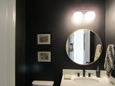 this half bathroom was repainted by certapro painters of gwinnett