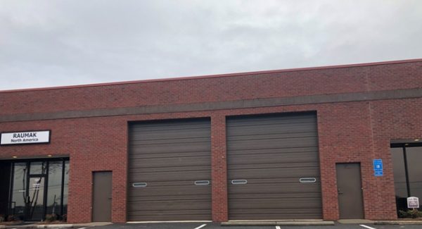 warehouse doors repainted by certapro painters of gwinnett