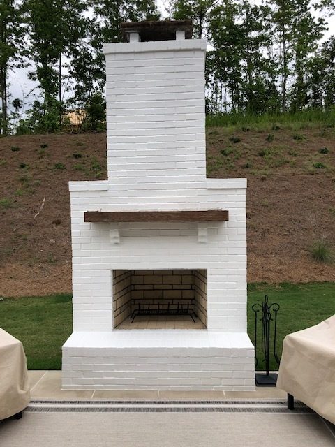brick fireplace repainted by certapro painters of gwinnett