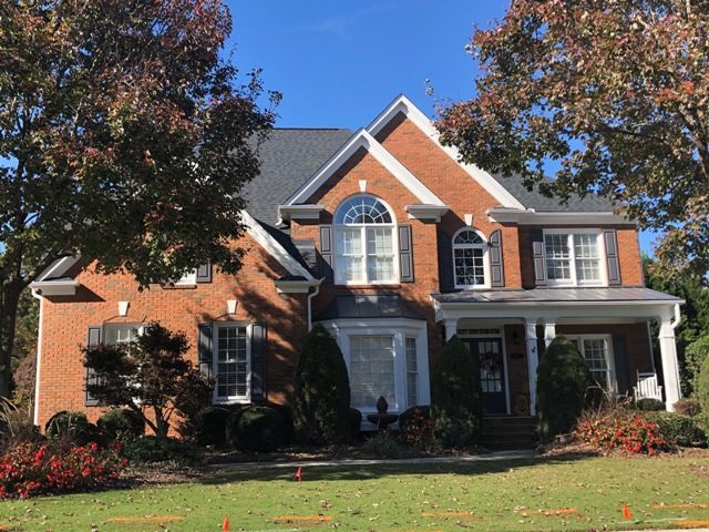 photo of repainted brick home in lawrenceville