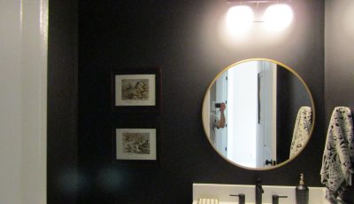 this half bathroom was repainted by certapro painters of gwinnett