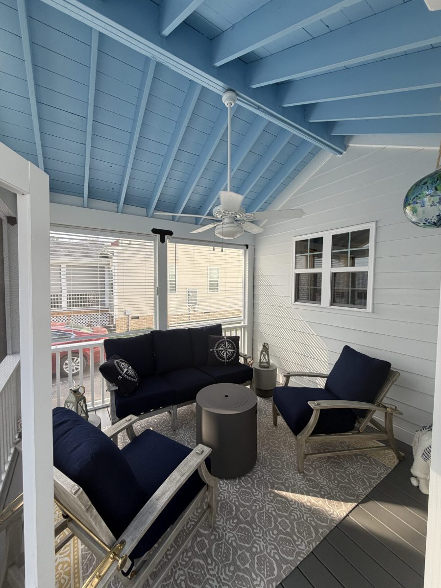 screened porch with blue painted ceiling