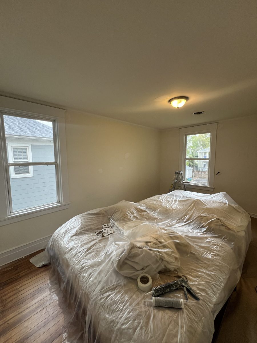 bedroom with protective sheeting on bed Preview Image 1