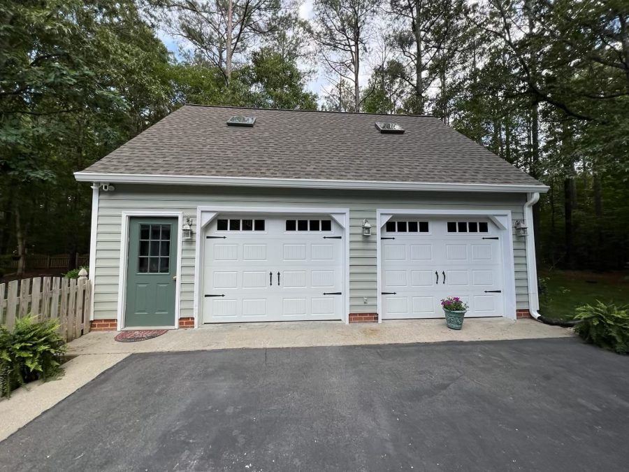detached garage with pale green siding Preview Image 2