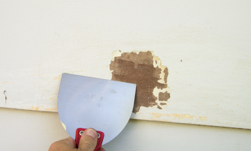 scraping and sanding preparation for paint