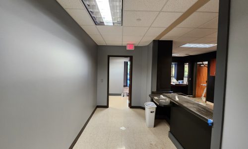 Black Common Area Space with Gray Hallways