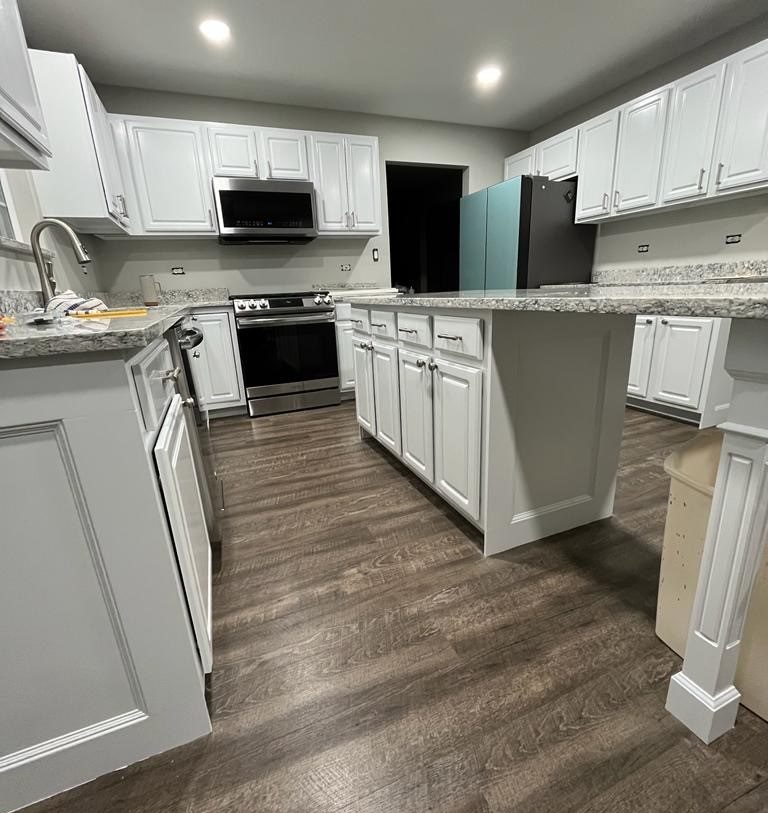 Drab Cabinets Repainted Modern White