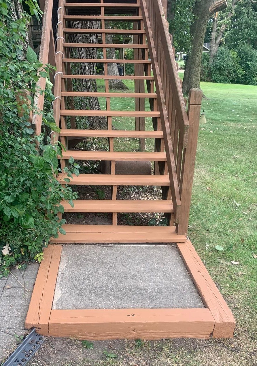 Wooden Stairs by Home Exterior Re-Stained