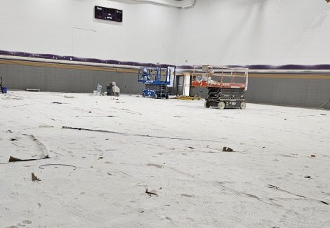 plastic sheeting on a gymnasium floor