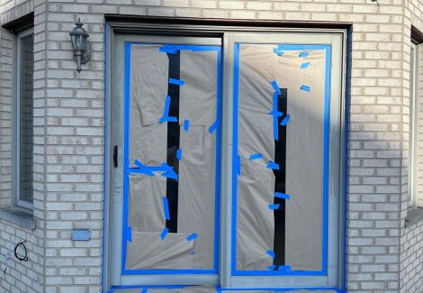 sliding glass door prepped for painting
