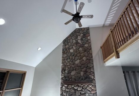 living room with vaulted ceiling