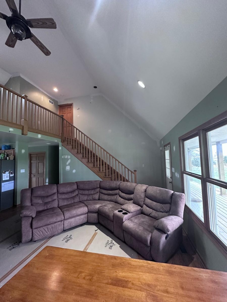 living room with couch and staircase to loft Preview Image 11