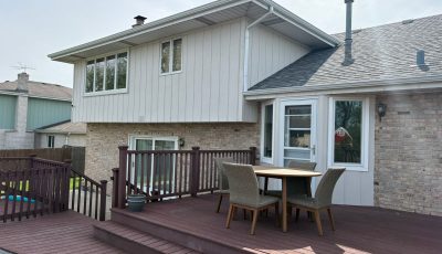 rear of house with attached deck