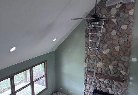 loft view of living room and fireplace