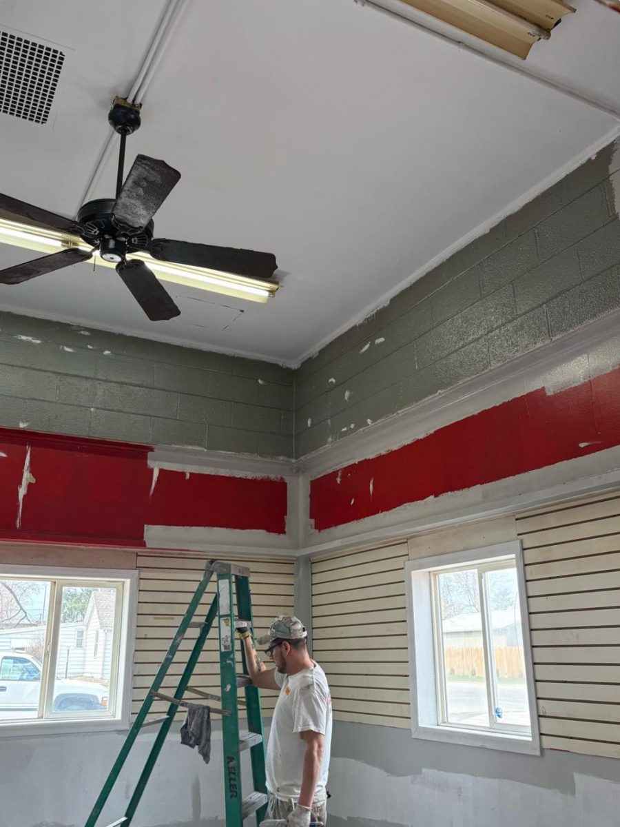 painter with ladder in industrial space Preview Image 4