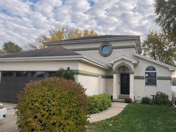 front entrance of stucco house Preview Image 1